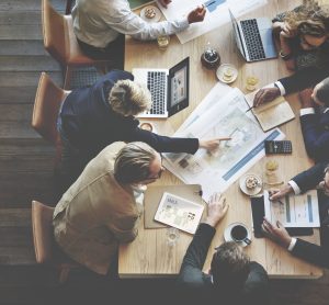 business people collaborating on a project at a table