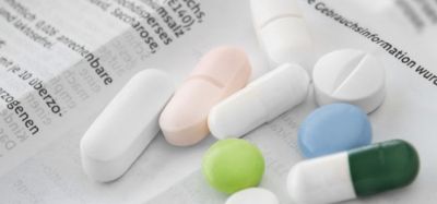 pills on top of a product information leaflet