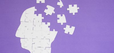 Concept of a human head using puzzle pieces