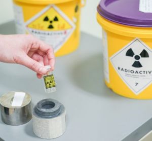 hand holding a vial of Iodine 131(I-131)- a Radioactive isotope used for hyperthyroidism treatment
