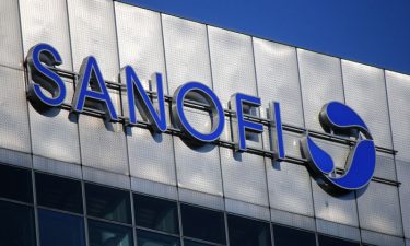 Sanofi logo on side of office building