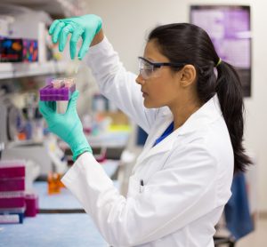 scientist in lab testing experiments