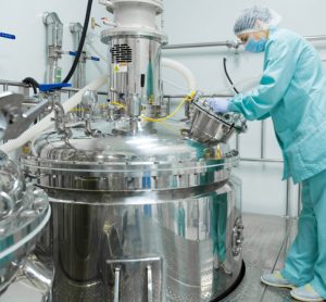 Worker in drug manufacturing facility