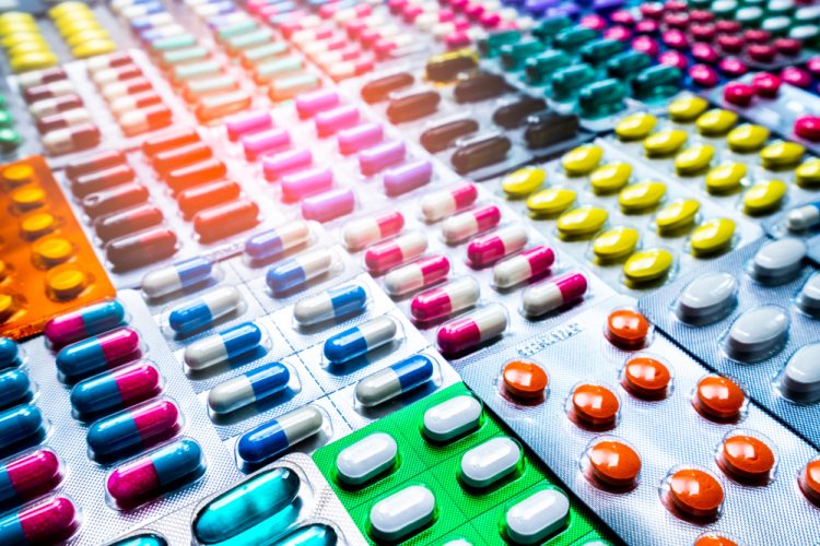 Different colour pills in blister packaging