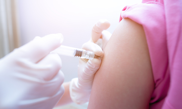 Vaccine been given to girl