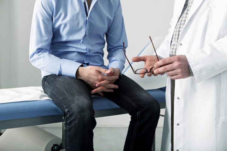 Man in consultation with doctor