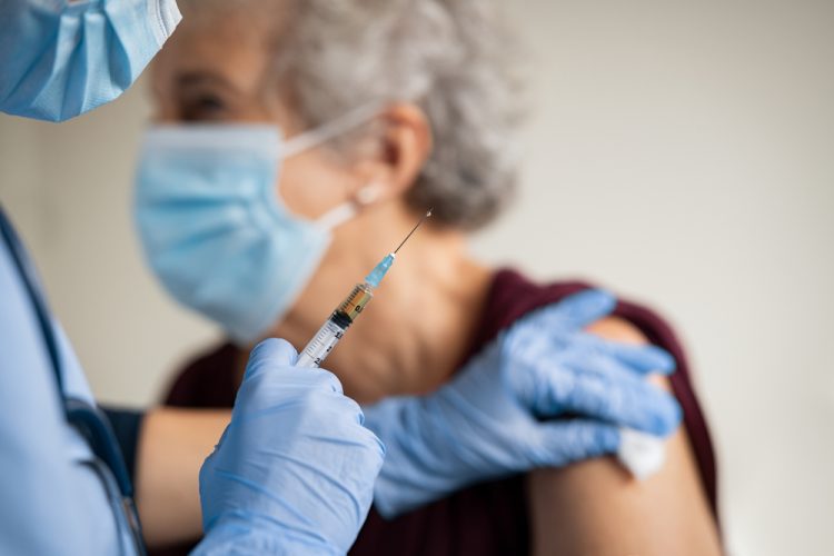Woman receiving vaccine