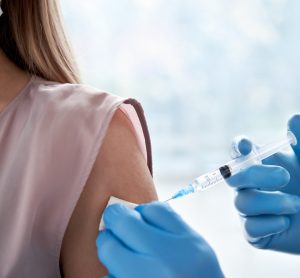 Woman receiving vaccine