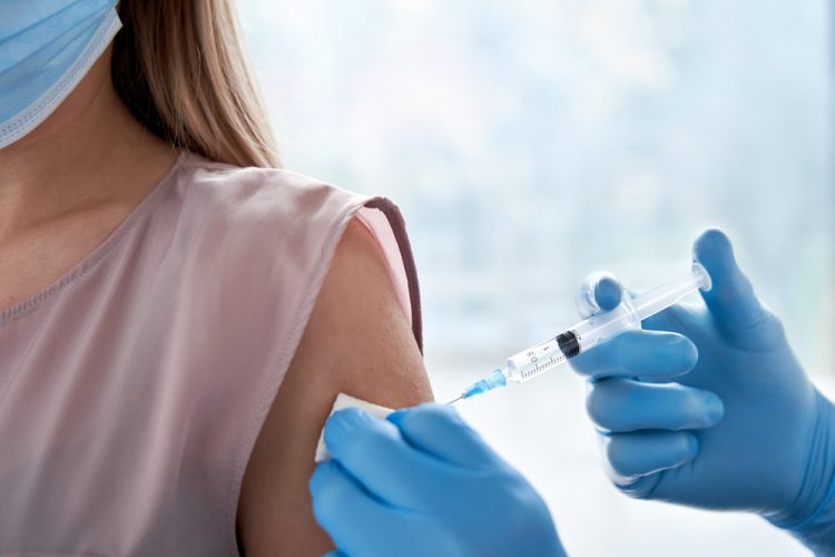 Woman receiving vaccine