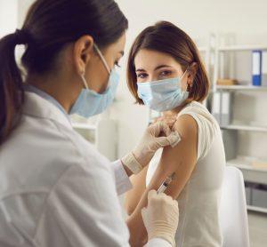 Woman receiving vaccine