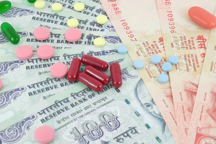 Pills lying on rupee notes