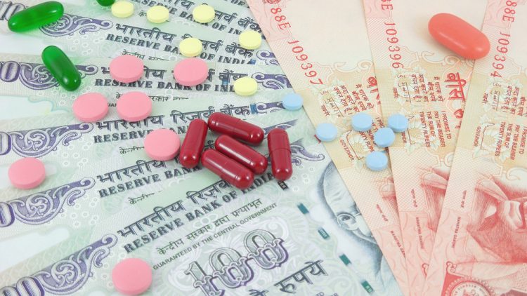 Pills lying on rupee notes