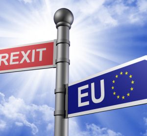 Signpost pointing in opposite directions to Brexit and the EU