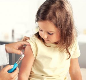 Child receiving vaccine