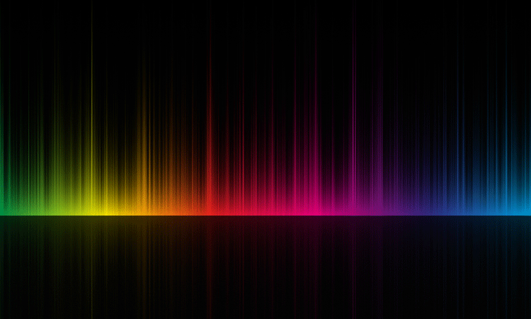 Black background with a rainbow spectrum on it - idea of Raman Spectrometry