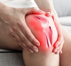 Photo of leg with knee highlighted in red