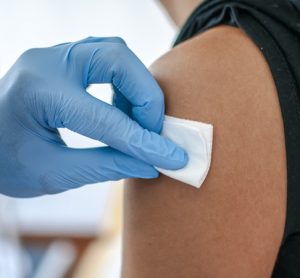 Patient being administered vaccine