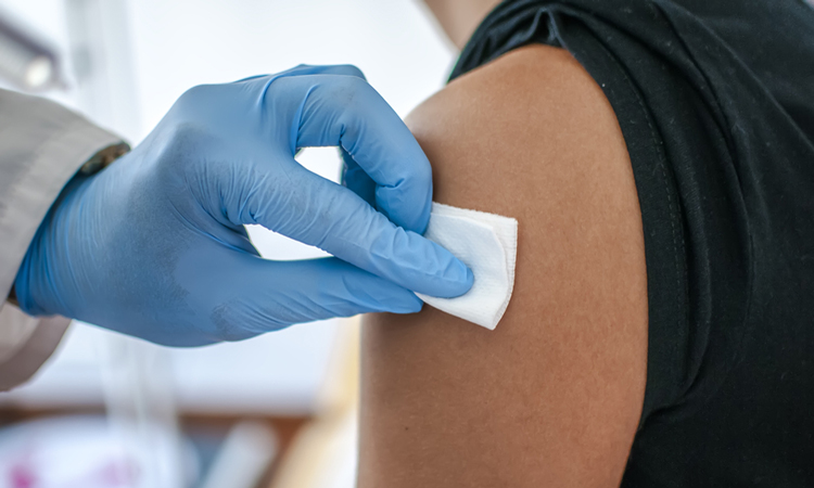 Patient being administered vaccine