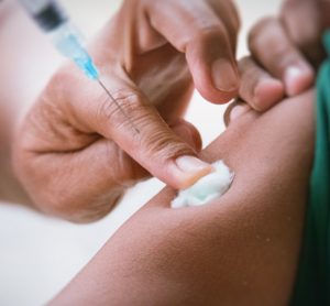 Vaccine being delivered closeup