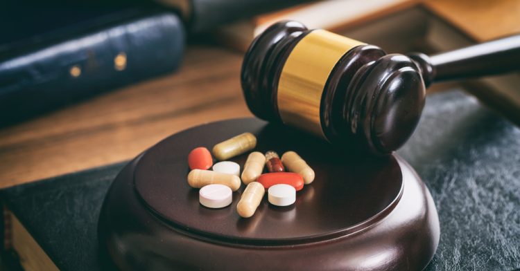 Pills near gavel