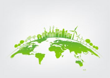sustainability concept with a green city/industry on the surface of the planet earth