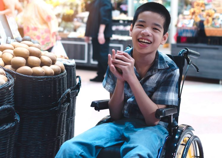 yound boy in a wheelchair